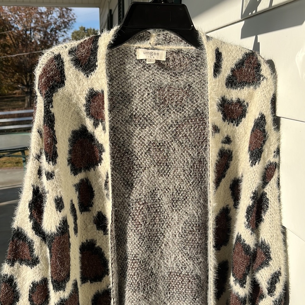 Umgee animal print, sort of.  Like new!